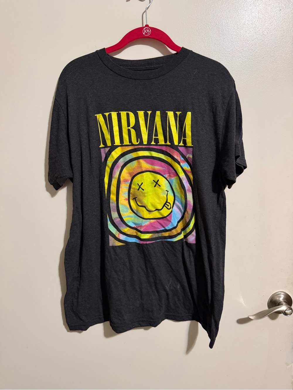 NIRVANA Black Tee with Yellow Logo and Tie-Dye Smiley